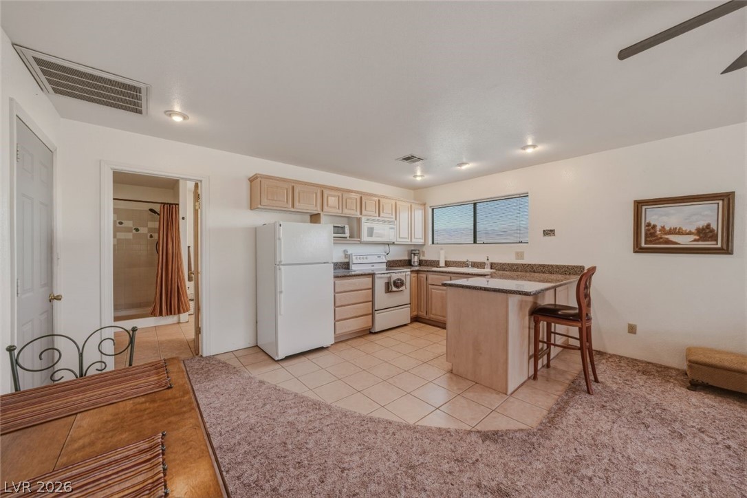 4892 Quail Run Road Pahrump, NV 89060 - Photo 66 of 90 RV garage family room