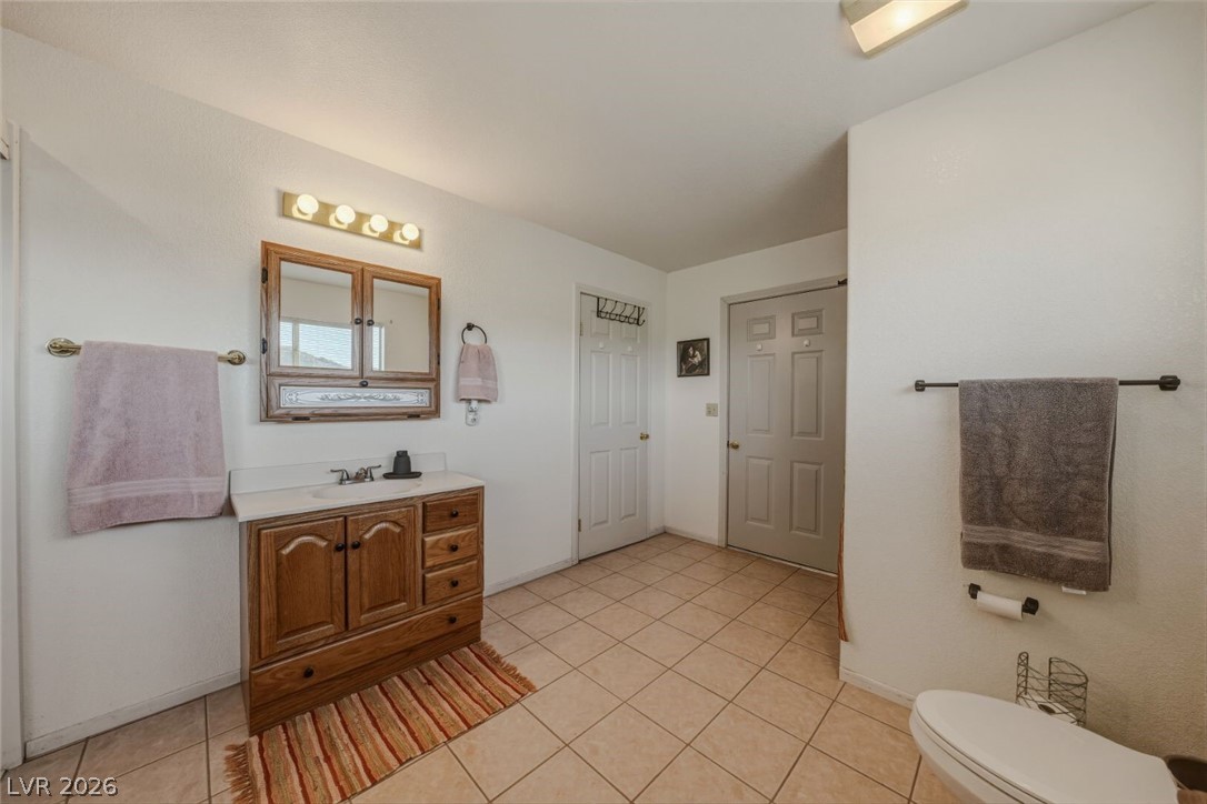 4892 Quail Run Road Pahrump, NV 89060 - Photo 68 of 90 RV garage bathroom
