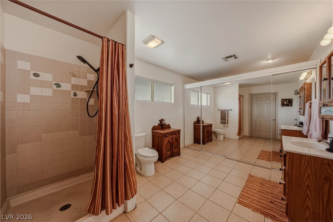 4892 Quail Run Road Pahrump, NV 89060 - Photo 69 of 90 RV garage bathroom