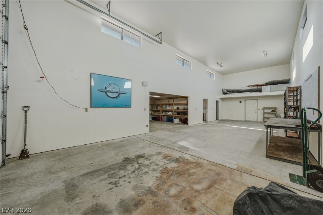 4892 Quail Run Road Pahrump, NV 89060 - Photo 70 of 90 This spacious interior offers an expansive area perfect for versatile use or storage.