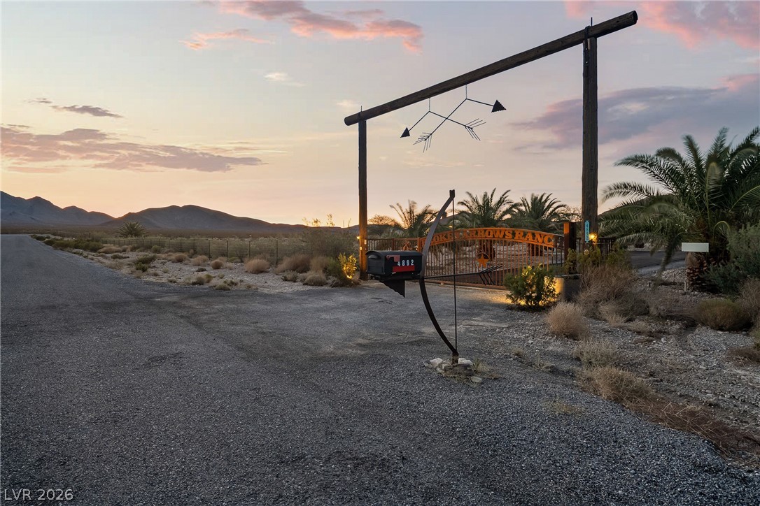 4892 Quail Run Road Pahrump, NV 89060 - Photo 7 of 90 This private entry features an elegant gate, welcoming you to your exclusive desert retreat.