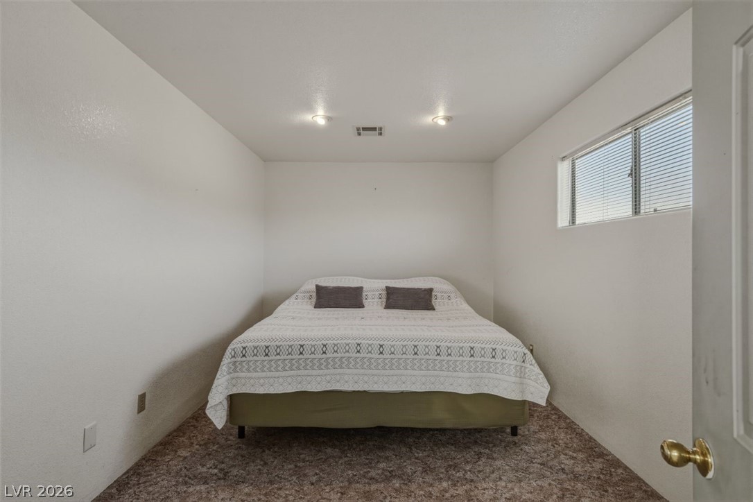 4892 Quail Run Road Pahrump, NV 89060 - Photo 73 of 90 RV garage bedroom 1