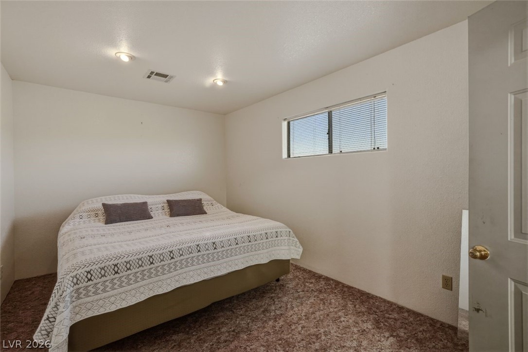 4892 Quail Run Road Pahrump, NV 89060 - Photo 74 of 90 RV garage bedroom 1