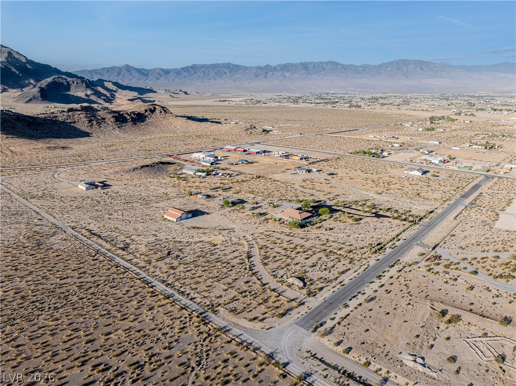 4892 Quail Run Road Pahrump, NV 89060 - Photo 80 of 90 This elevated perspective showcases expansive undeveloped land with distant mountain ranges.