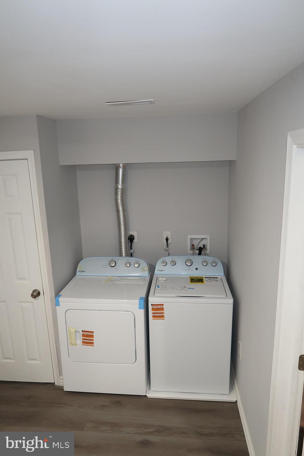 2833 Brendan Avenue, Unit 1 Baltimore, MD 21213 - Photo 16 of 26 a utility room with dryer and washer