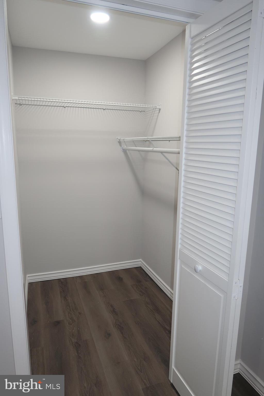 2833 Brendan Avenue, Unit 1 Baltimore, MD 21213 - Photo 21 of 26 a view of a room with racks on the wall