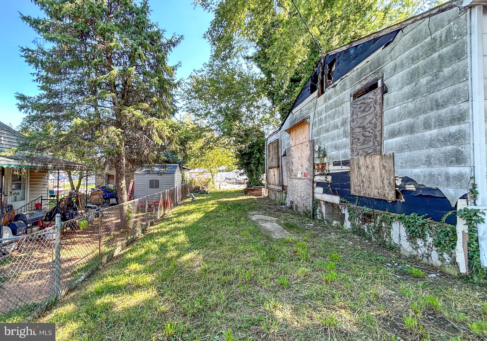 1882 Marshall Road Baltimore, MD 21222 - Photo 5 of 13 a backyard of a house with table and chairs