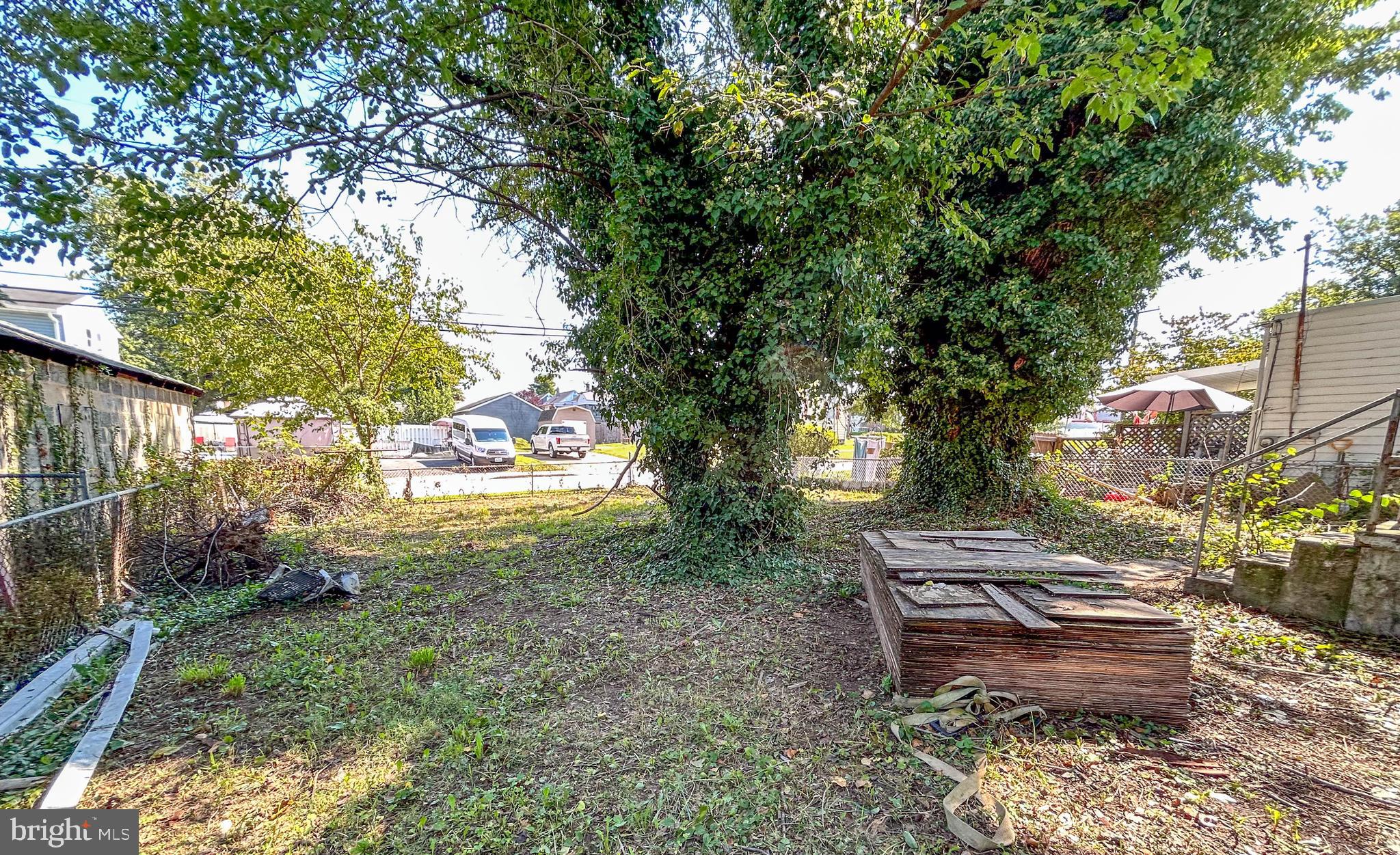 1882 Marshall Road Baltimore, MD 21222 - Photo 7 of 13 a view of a bench in a backyard