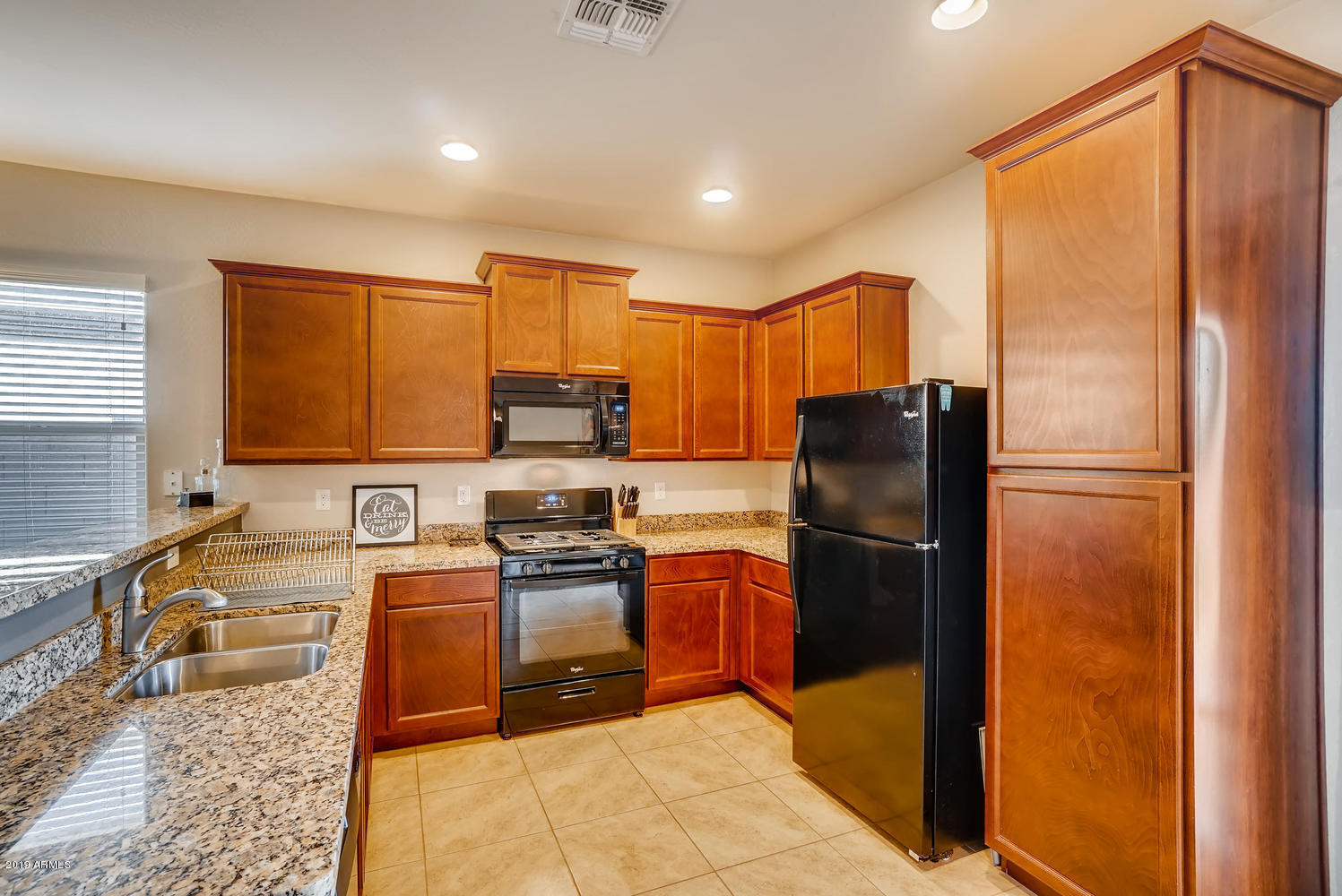 7721 West Carter Road Laveen, AZ 85339 - Photo 2 of 13 Kitchen with granite counter tops.