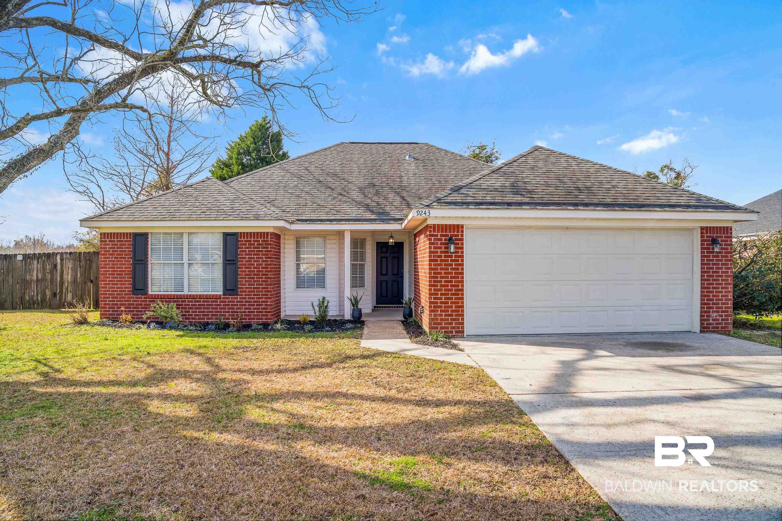 9243 Brookshire Loop Daphne, AL 36526 - Photo 1 of 26 Ranch-style home with a garage and a front yard