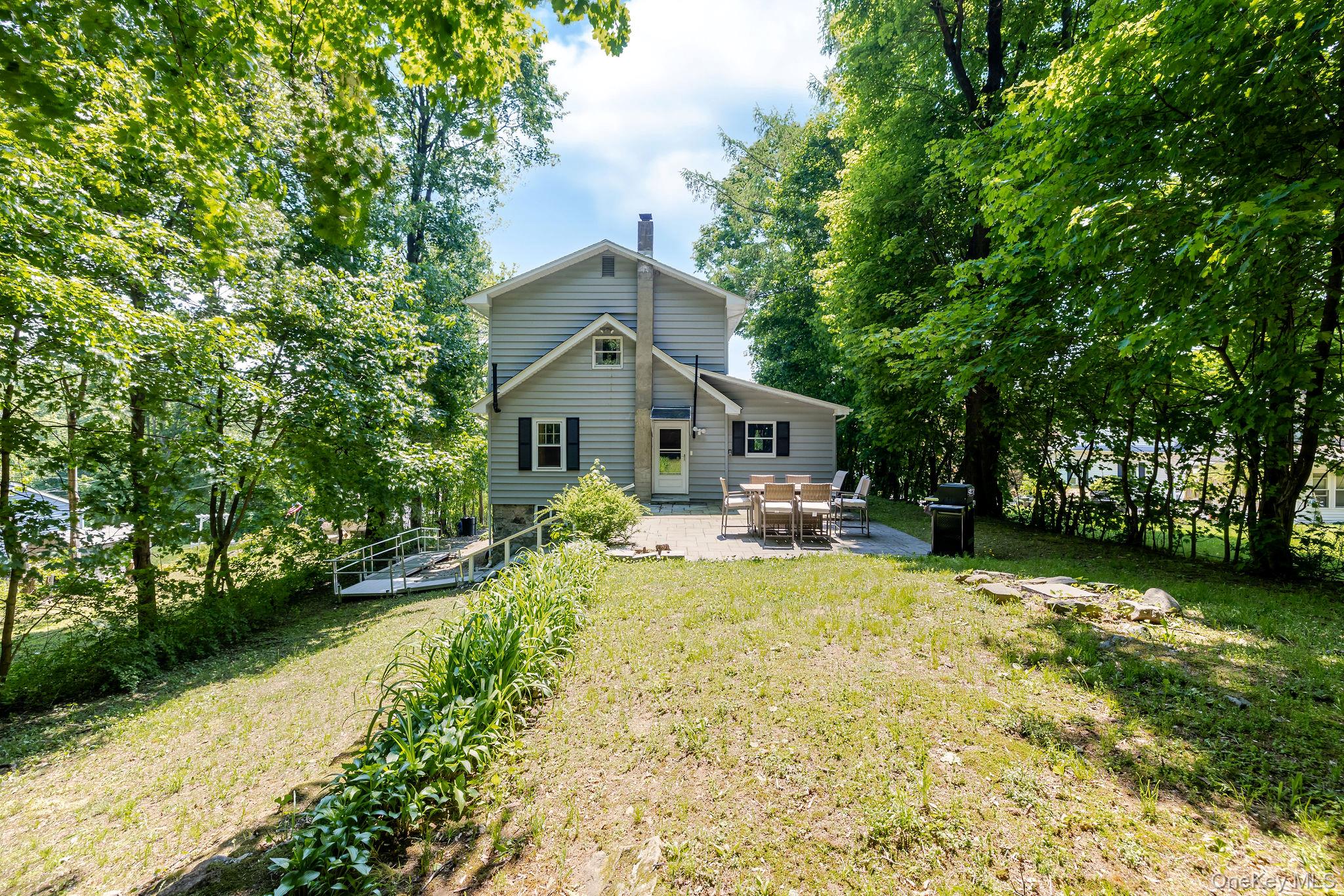 12 Bradhurst Road Carmel, NY 10512 - Photo 26 of 28 a front view of a house with yard and green space
