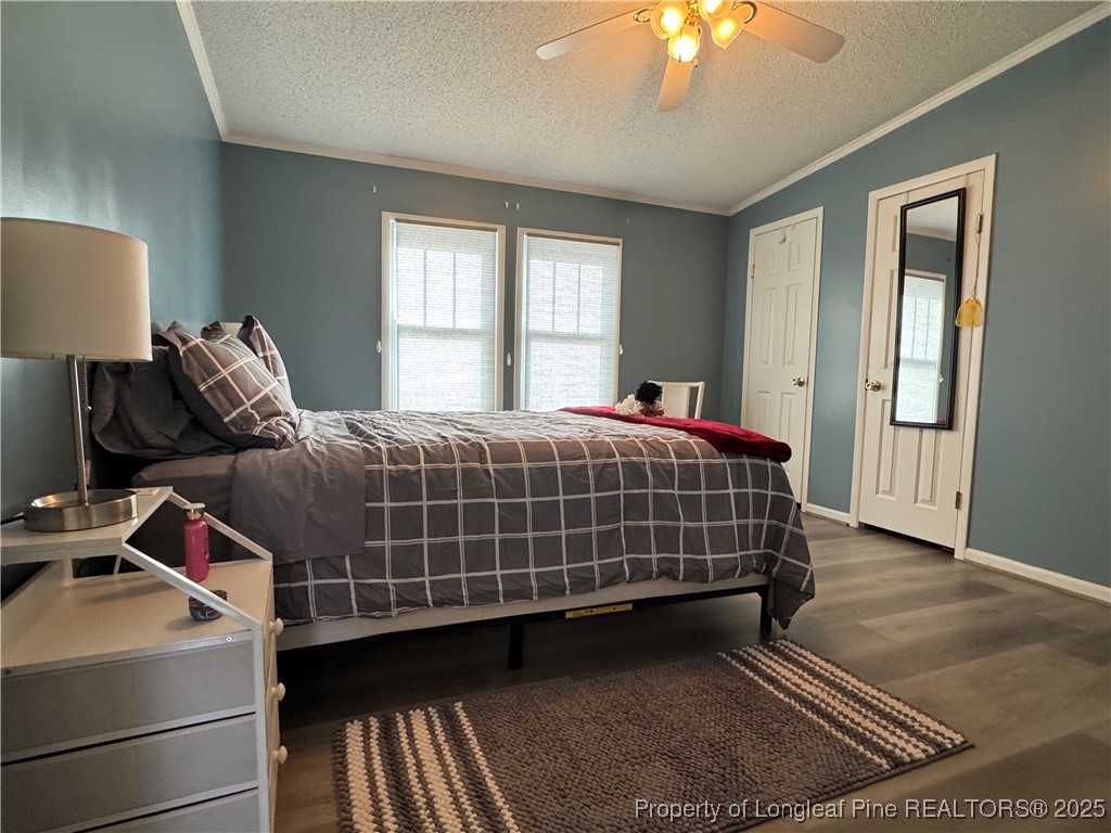 100 Wallace McClean Road Raeford, NC 28376 - Photo 32 of 38 a bedroom with a bed and a window