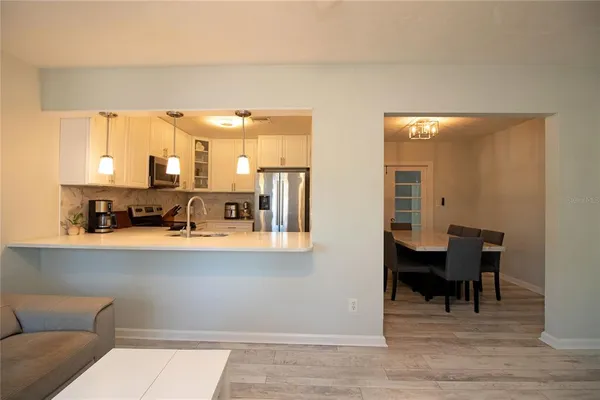 a view of living room with furniture and window