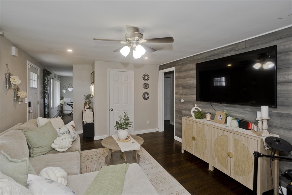 1815 Parker Street Springfield, MA 01128 - Photo 11 of 33 a living room with furniture and a flat screen tv