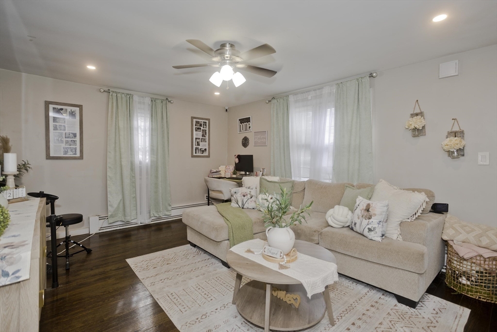 1815 Parker Street Springfield, MA 01128 - Photo 13 of 33 a living room with furniture and wooden floor