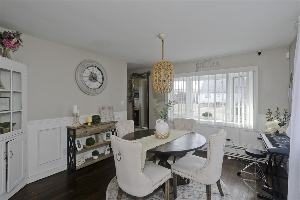 1815 Parker Street Springfield, MA 01128 - Photo 14 of 33 a view of a dining room with furniture window and wooden floor