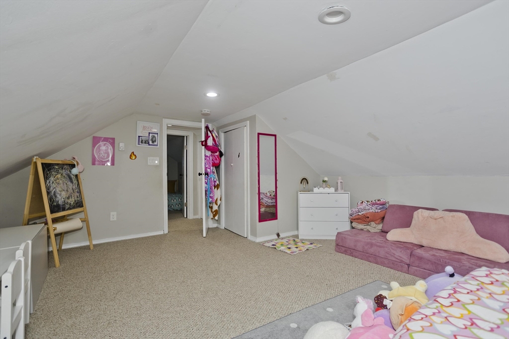 1815 Parker Street Springfield, MA 01128 - Photo 21 of 33 a bedroom with furniture and a bed