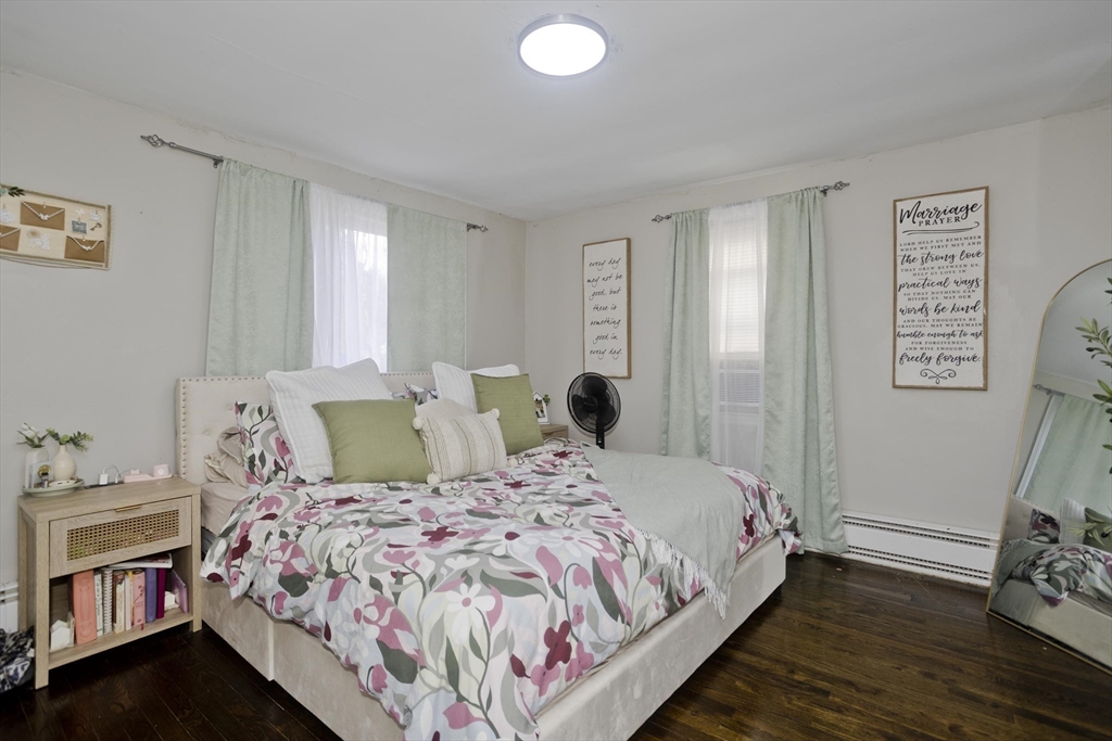 1815 Parker Street Springfield, MA 01128 - Photo 24 of 33 a bedroom with a bed and a window