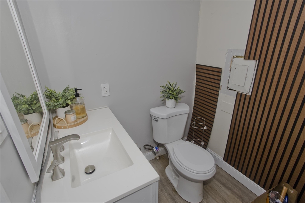 1815 Parker Street Springfield, MA 01128 - Photo 28 of 33 a white toilet sitting next to a white sink