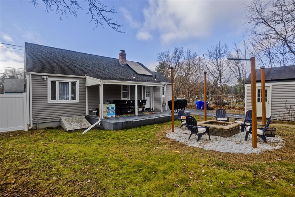 1815 Parker Street Springfield, MA 01128 - Photo 3 of 33 a view of a house with swimming pool and sitting area