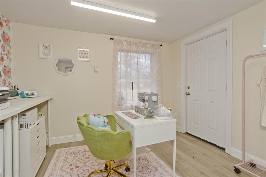1815 Parker Street Springfield, MA 01128 - Photo 31 of 33 a spacious bathroom with a granite countertop sink a mirror and a bathtub