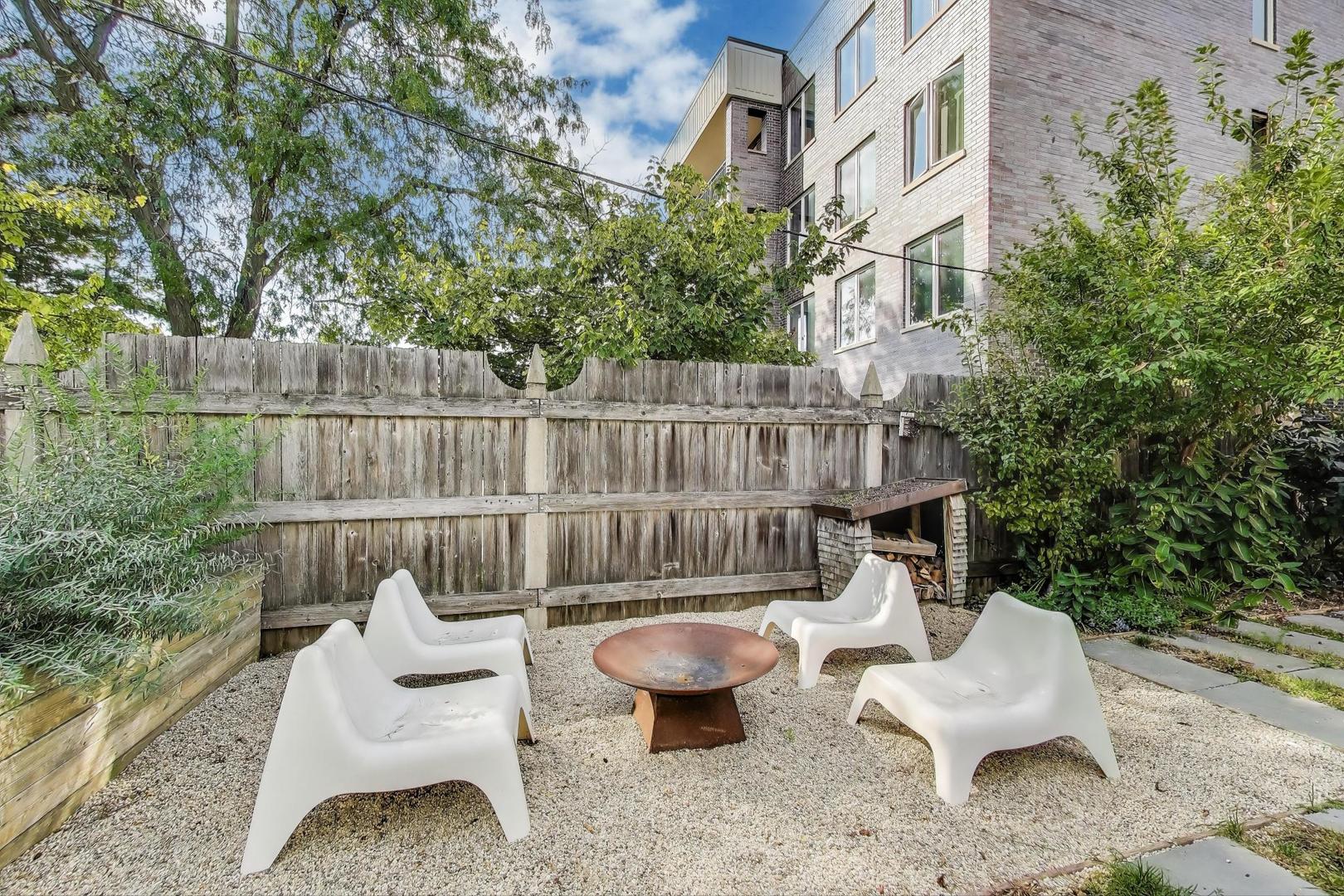 6411 Elm Street Morton Grove, IL 60053 - Photo 46 of 49 a view of a patio with couches chairs and a fire pit
