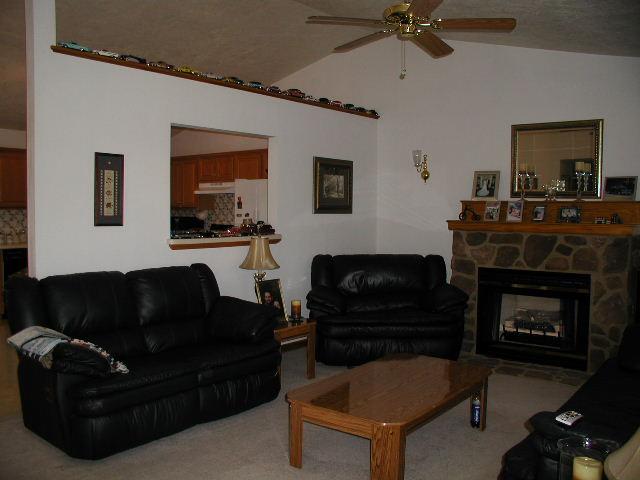2498 Edwardsville Road Hardy, VA 24101 - Photo 3 of 14 a living room with furniture and a fireplace