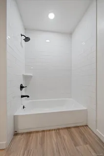 a bathroom with a bathtub
