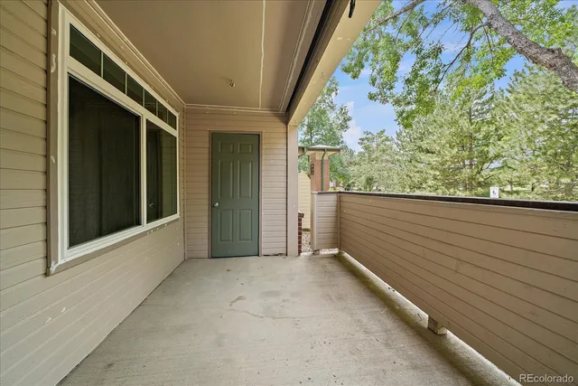 a view of a balcony with an outdoor space