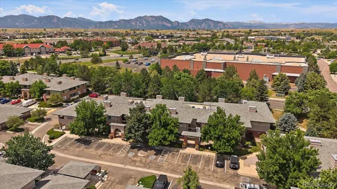 an aerial view of a city with lots of residential buildings