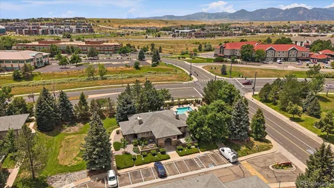 an aerial view of residential building and lake view