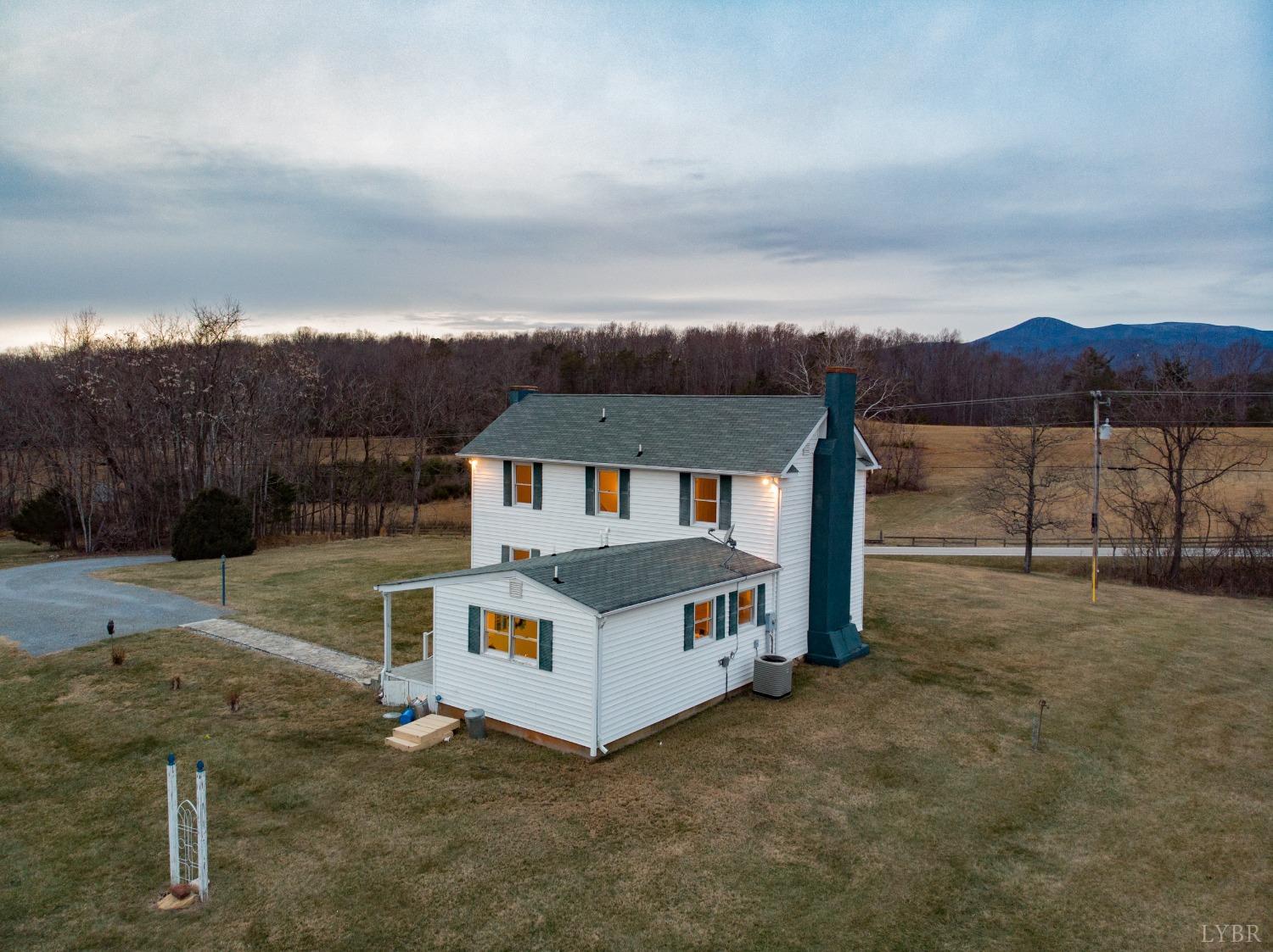 1394 Lowesville Road Amherst, VA 24521 - Photo 4 of 38 front view of house with a yard