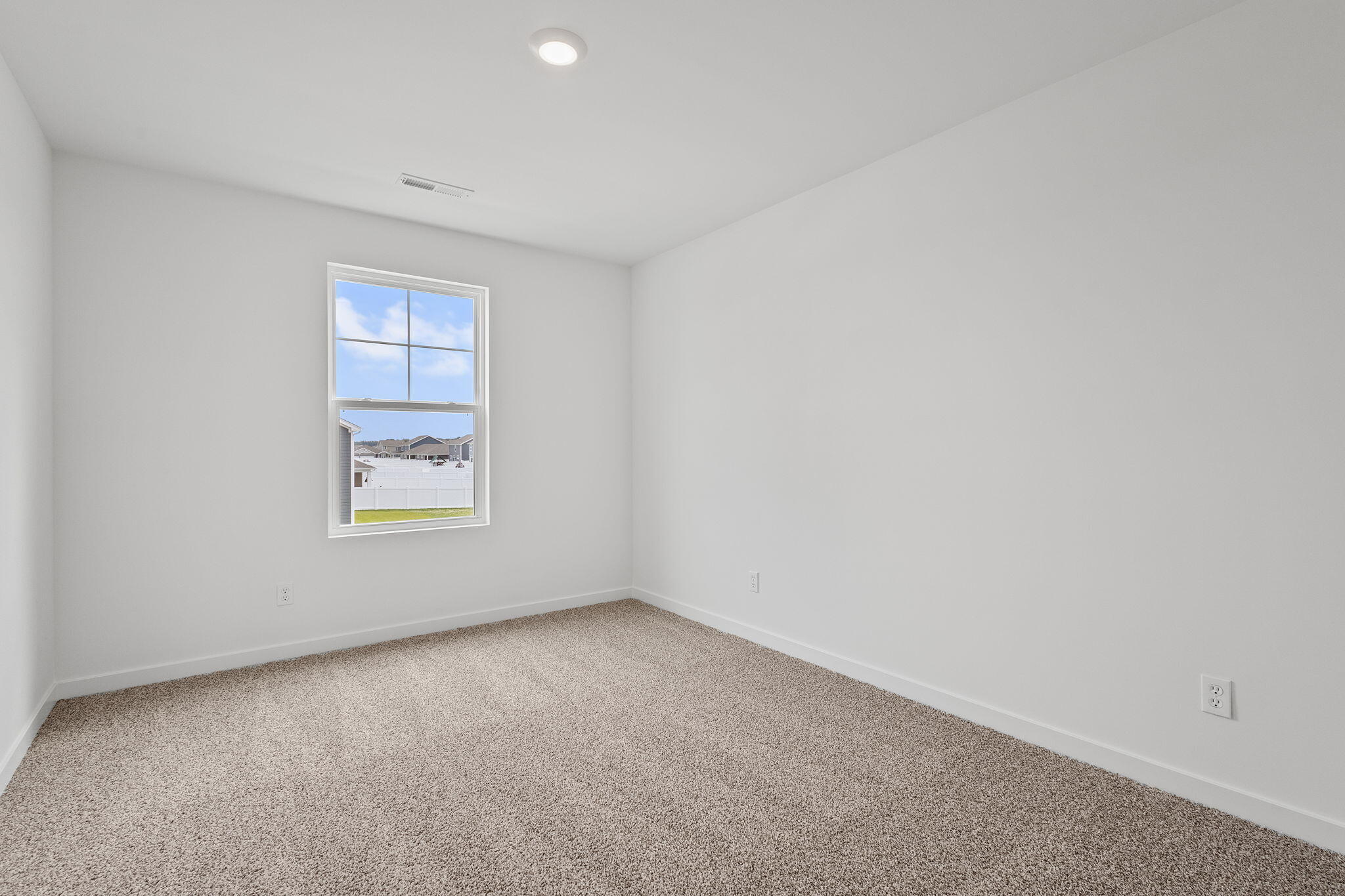 10691 Blaine Street Crown Point, IN 46307 - Photo 26 of 29 a view of an empty room with a window