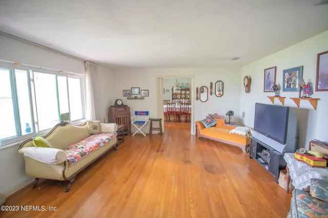 a kitchen with granite countertop a sink and a stove