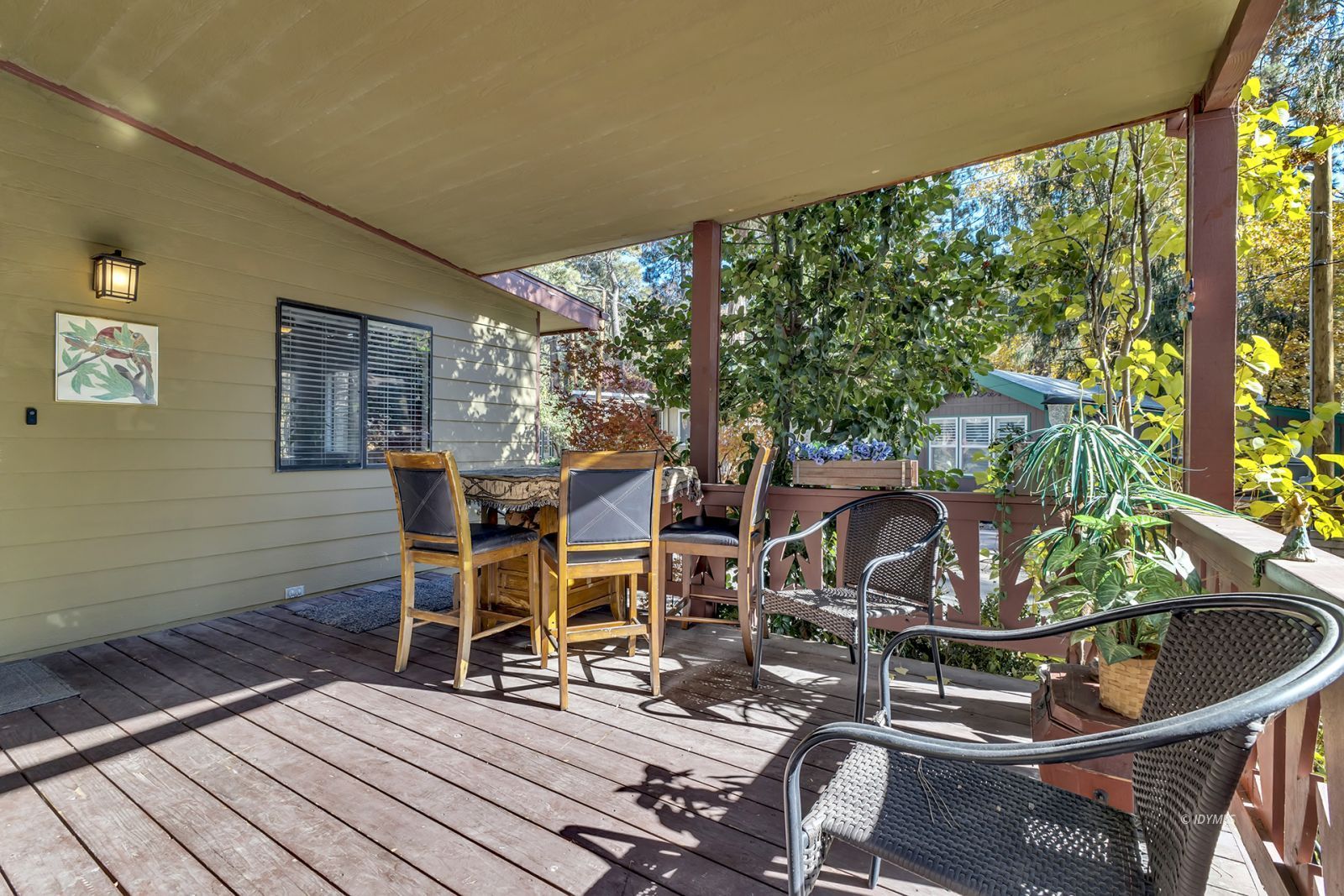 25955 Highway 243, Unit 18 Idyllwild, CA 92549 - Photo 11 of 46 a view of a chairs and table in the balcony