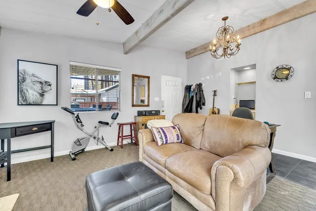 a kitchen with stainless steel appliances granite countertop a stove and a microwave