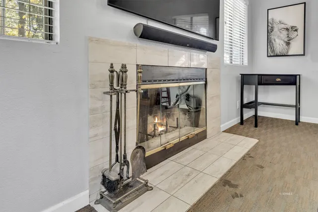 a stove sitting inside of a kitchen with stainless steel appliances