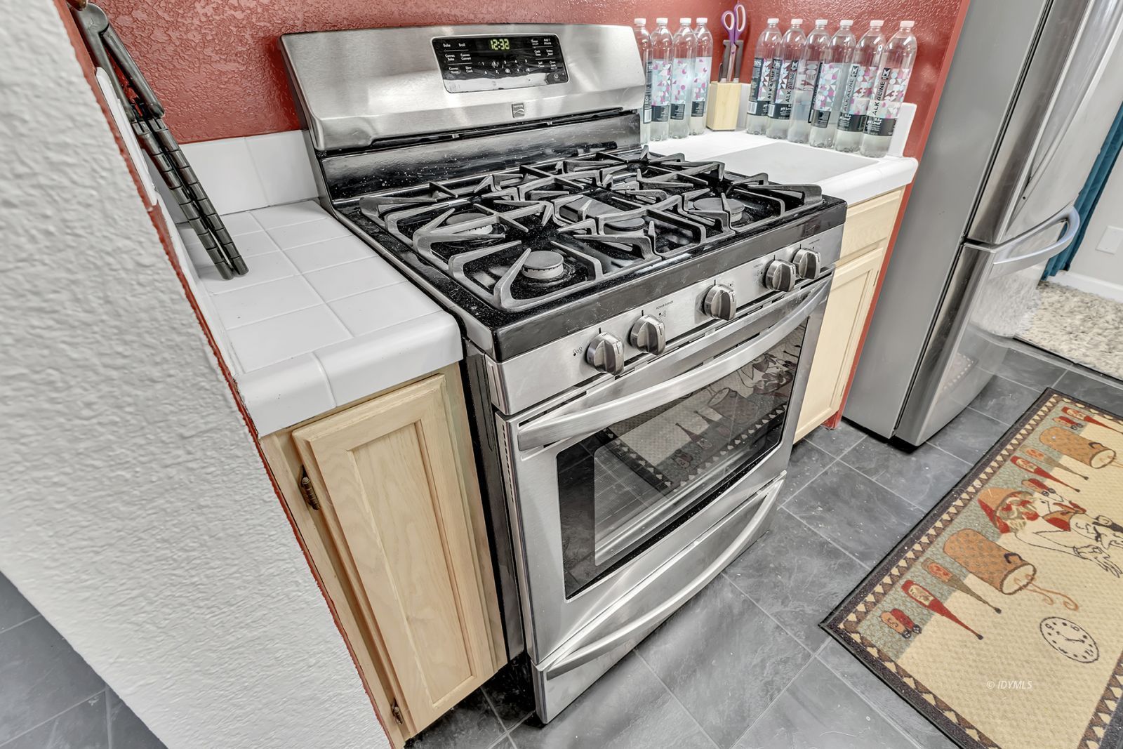 25955 Highway 243, Unit 18 Idyllwild, CA 92549 - Photo 22 of 46 a stove sitting inside of a kitchen with stainless steel appliances