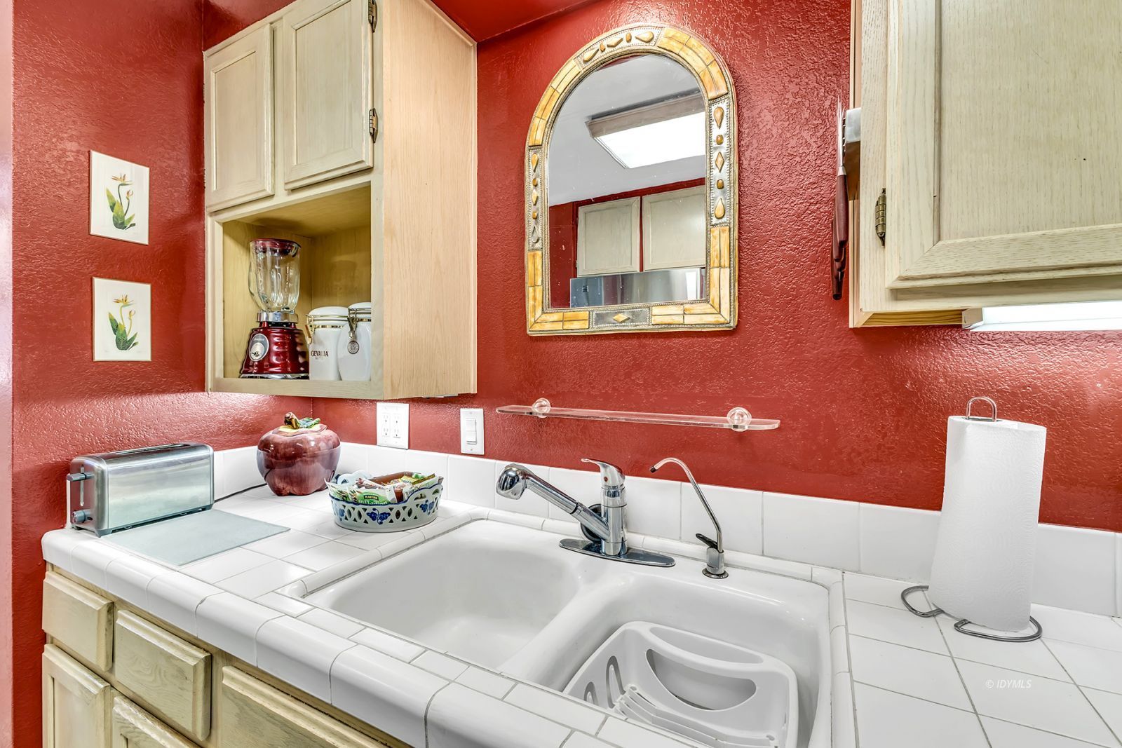 25955 Highway 243, Unit 18 Idyllwild, CA 92549 - Photo 24 of 46 a bathroom with a granite countertop sink a toilet and mirror