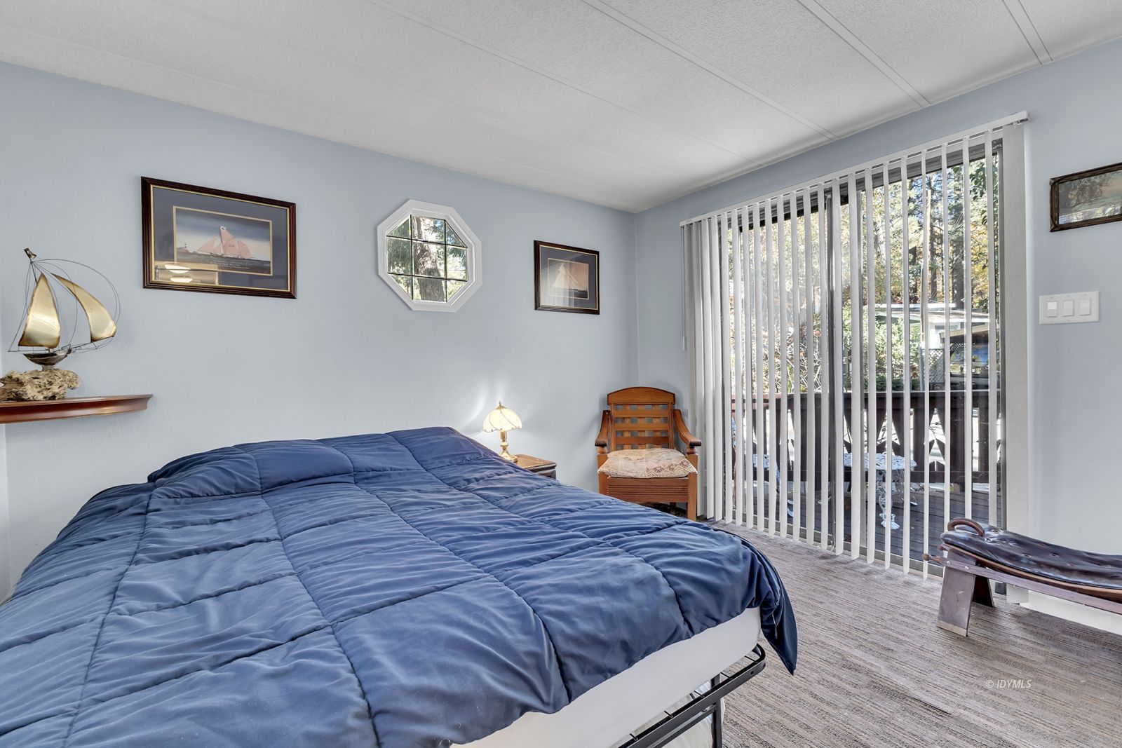 25955 Highway 243, Unit 18 Idyllwild, CA 92549 - Photo 27 of 46 a bedroom with a bed and a window