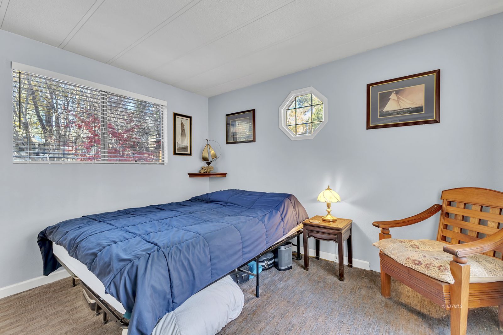 25955 Highway 243, Unit 18 Idyllwild, CA 92549 - Photo 28 of 46 a bedroom with a bed and a window