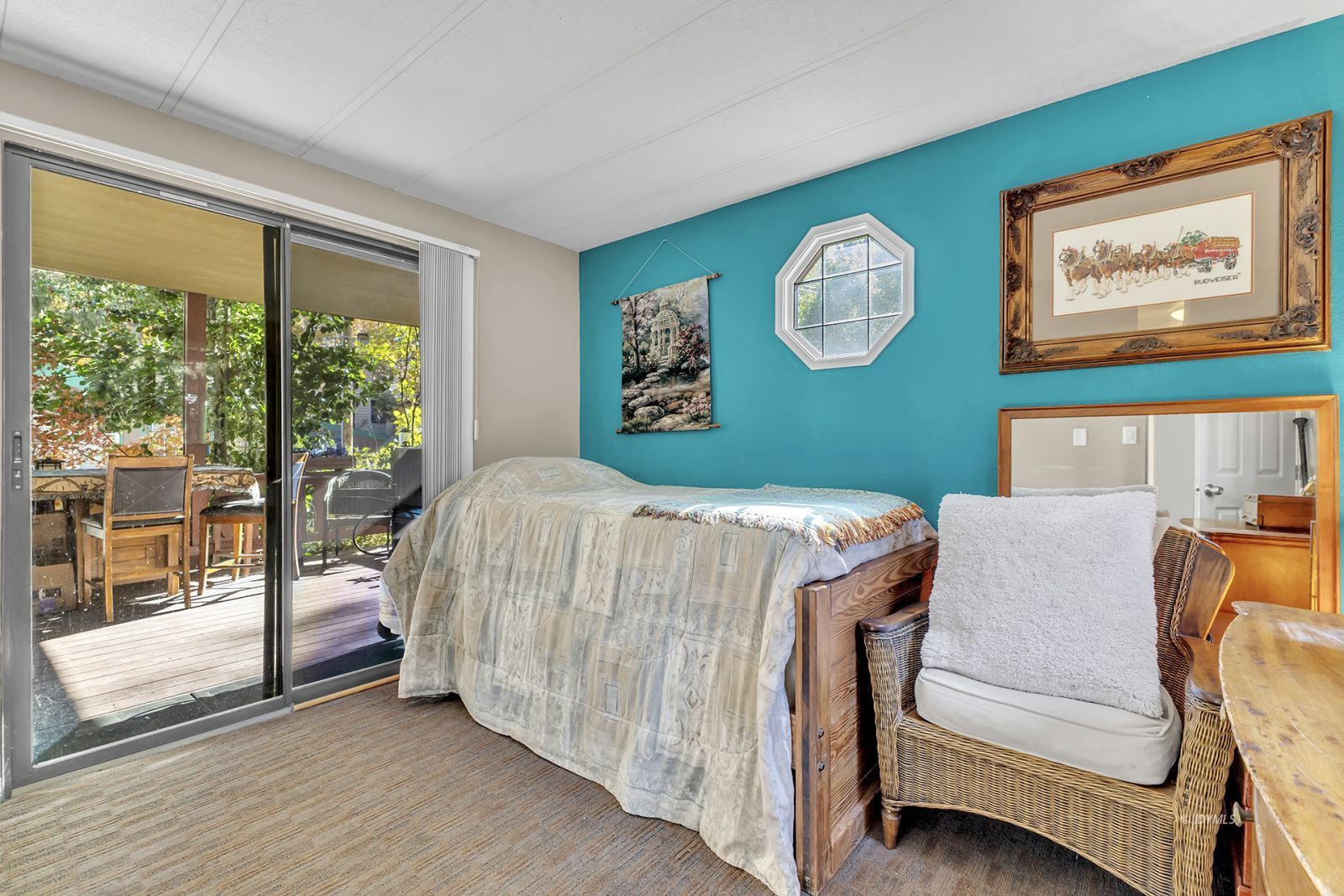 25955 Highway 243, Unit 18 Idyllwild, CA 92549 - Photo 32 of 46 a bedroom with a bed and a large window