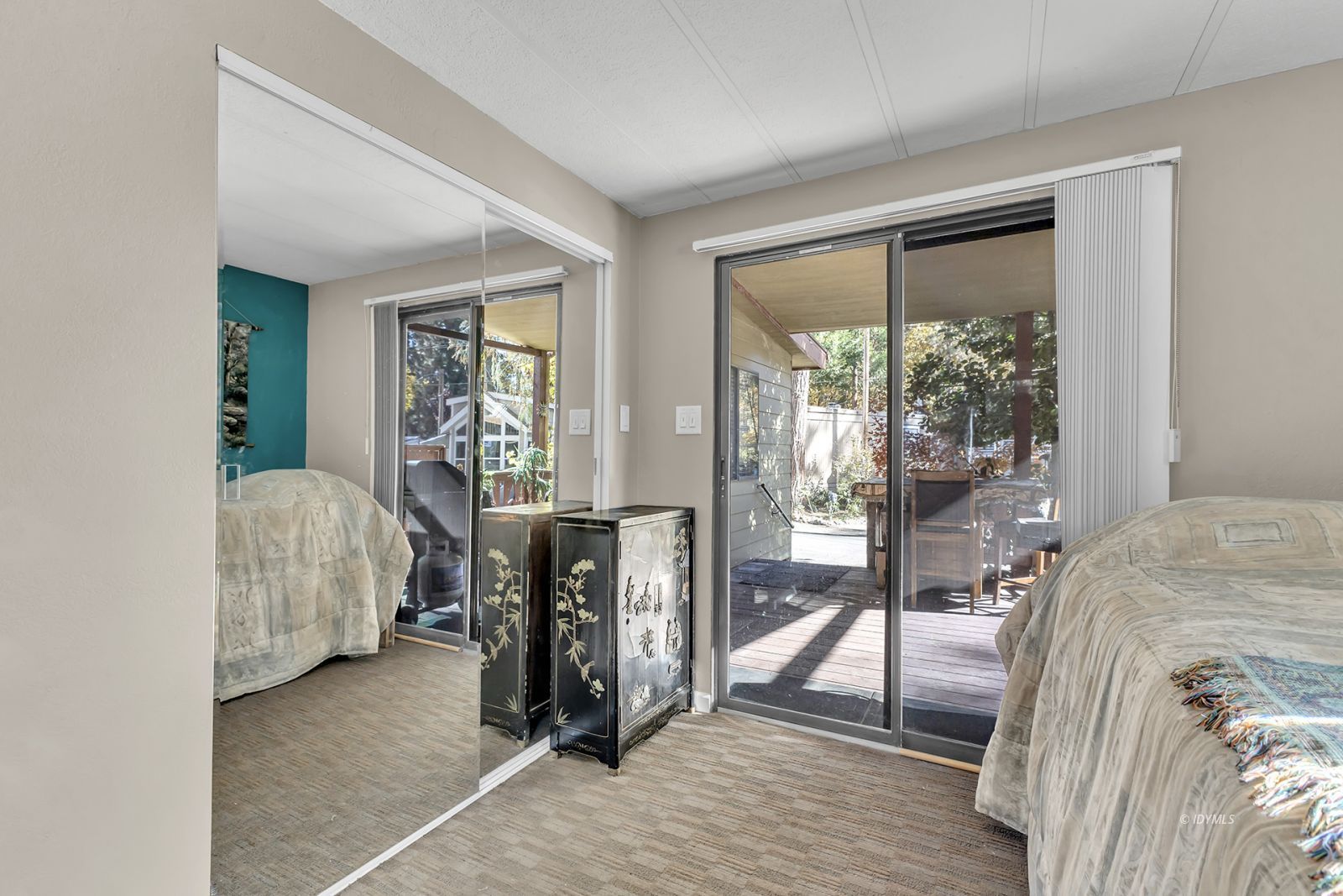 25955 Highway 243, Unit 18 Idyllwild, CA 92549 - Photo 34 of 46 a bedroom with furniture and a window