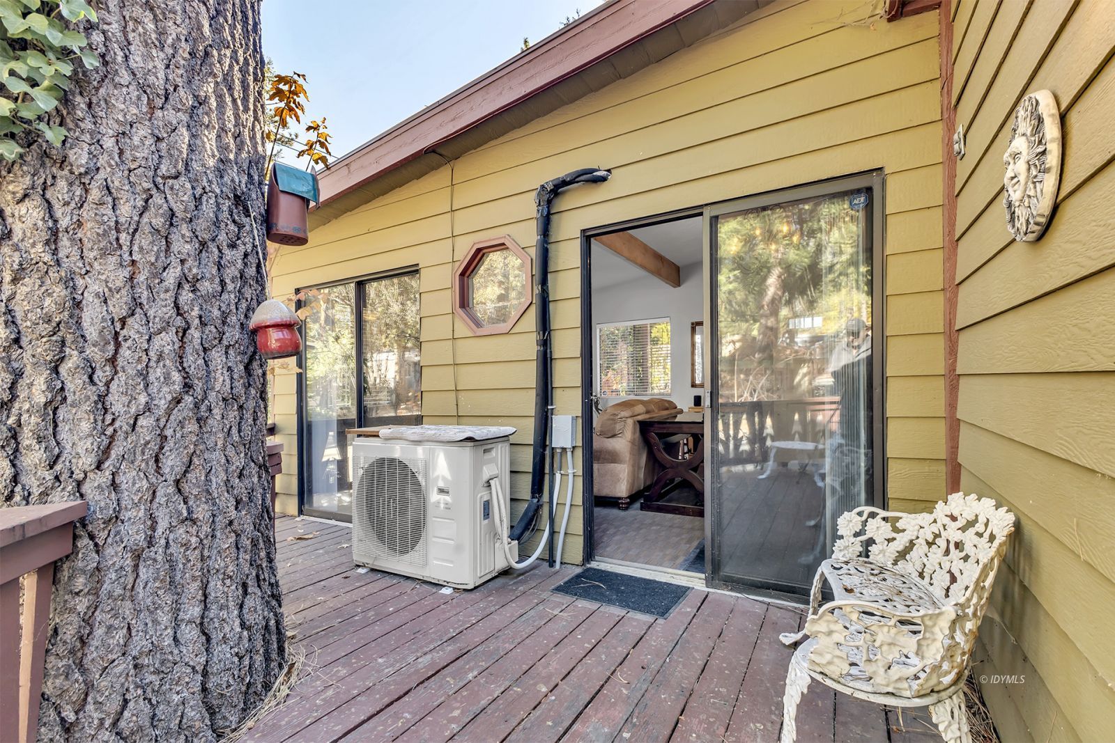 25955 Highway 243, Unit 18 Idyllwild, CA 92549 - Photo 38 of 46 a floor to ceiling window with wooden floor