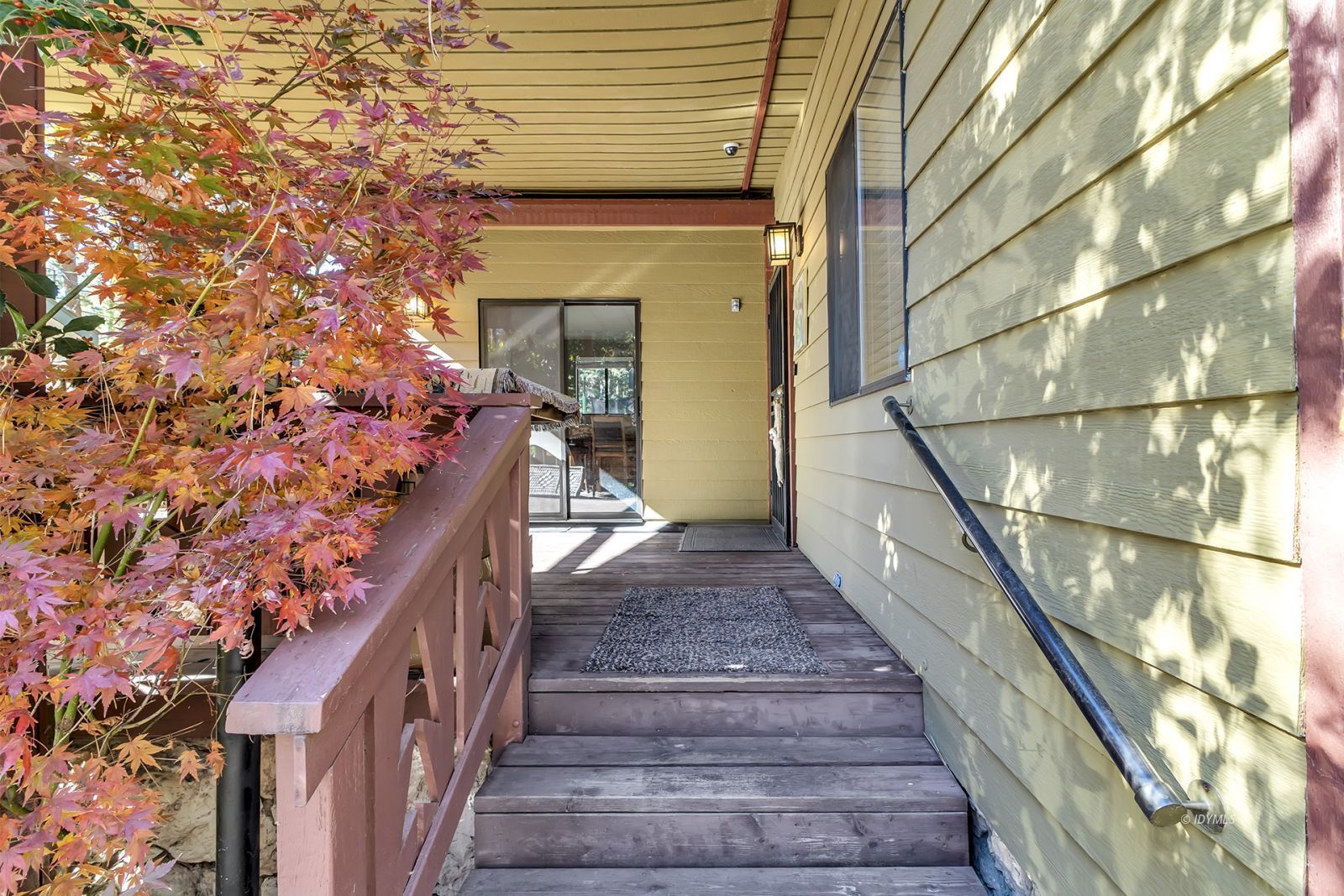 25955 Highway 243, Unit 18 Idyllwild, CA 92549 - Photo 7 of 46 a view of a pathway of a building with wooden stairs