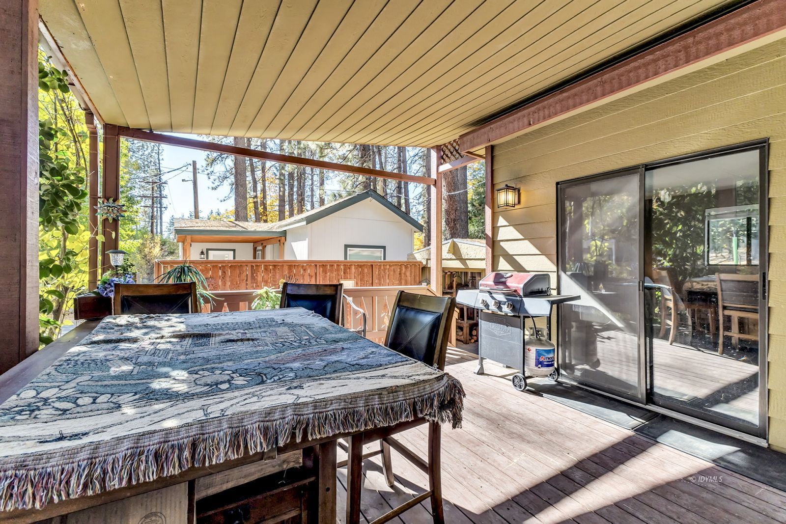 25955 Highway 243, Unit 18 Idyllwild, CA 92549 - Photo 8 of 46 a living room with a table chairs and a table