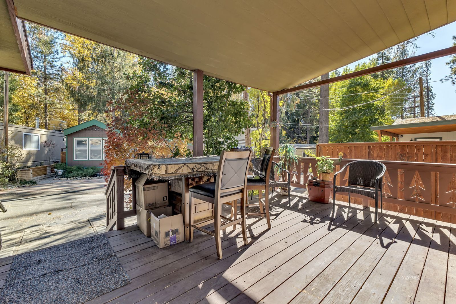 25955 Highway 243, Unit 18 Idyllwild, CA 92549 - Photo 10 of 46 a view of a patio with wooden floor