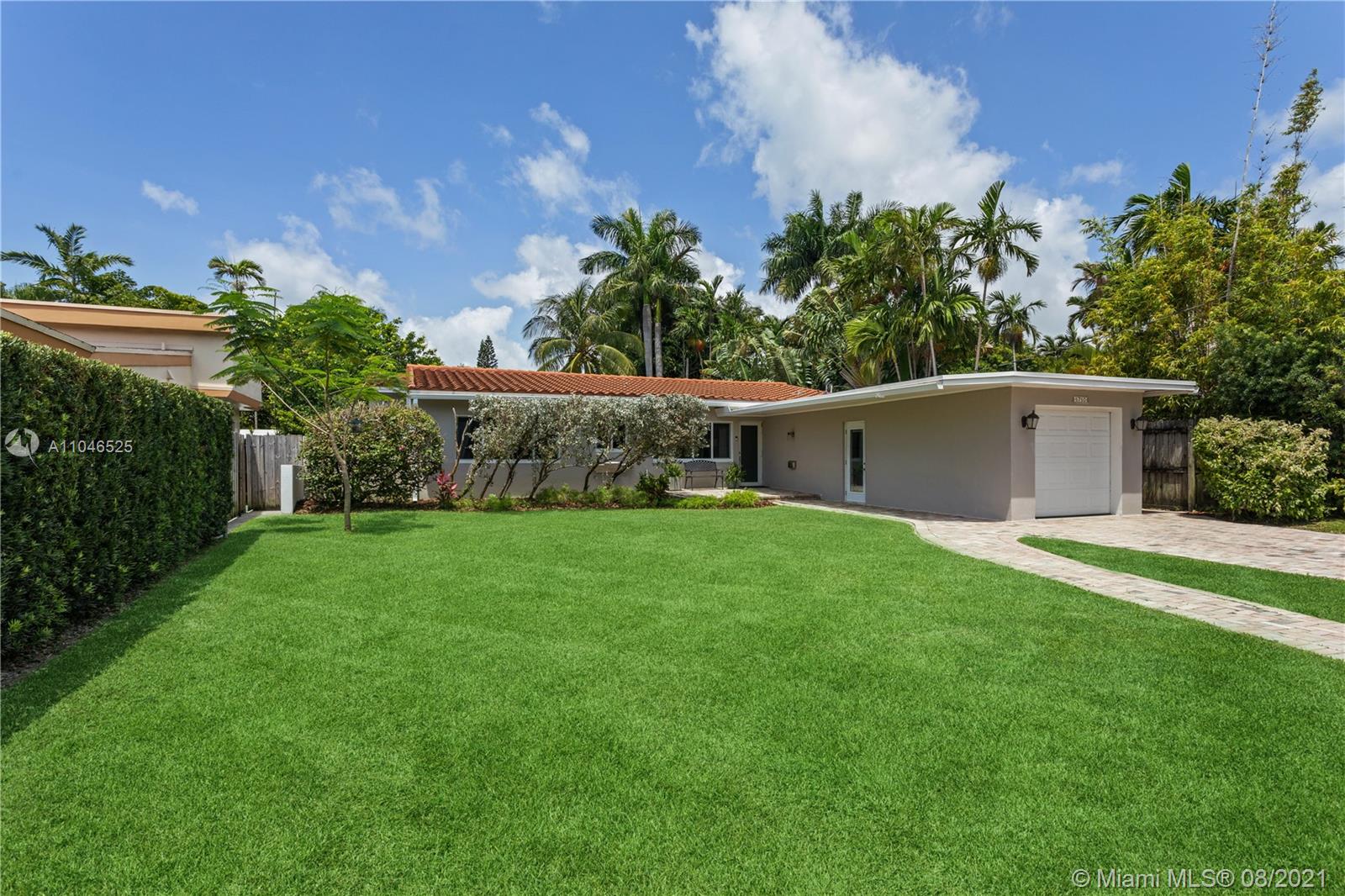 5750 Alton Road Miami Beach, FL 33140 - Photo 2 of 21 a view of a backyard