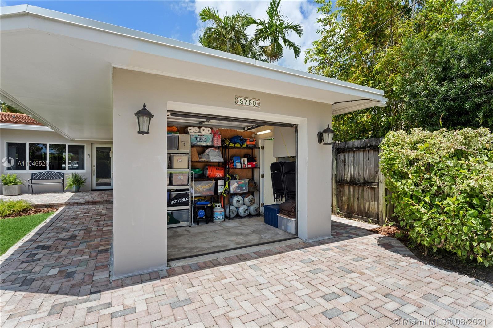 5750 Alton Road Miami Beach, FL 33140 - Photo 19 of 21 a view of a porch with seating space