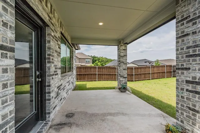 a workspace with furniture and a window